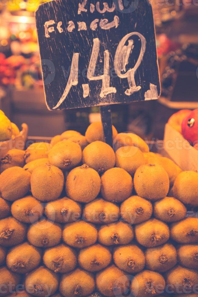 Fruits and vegetables stall in La Boqueria, the most famous market in Barcelona. photo