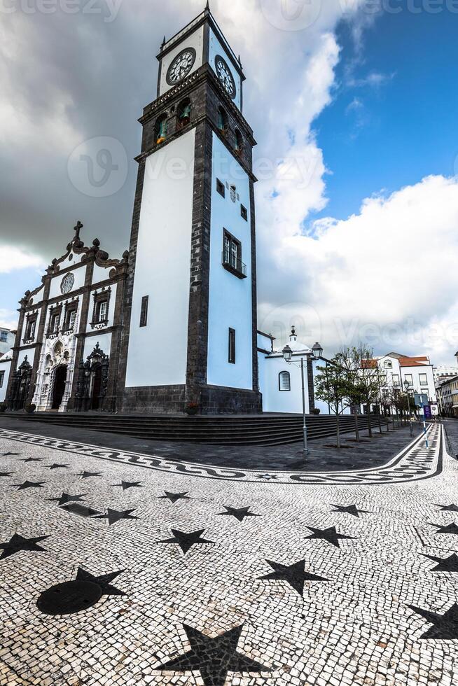 Tower of St. Sebastian church Igreja Matriz de Sao Sebastiao in Ponta Delgada, San Miguel, the Autonomous Region of the Azores, Portugal. photo