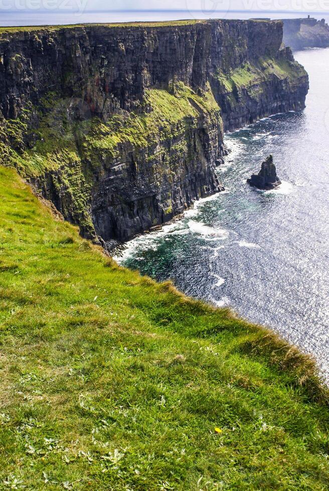 Famous cliffs of Moher with tower. Ireland photo