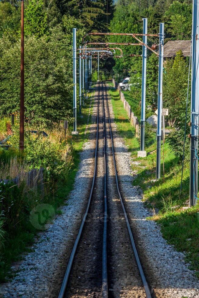 Railway tracks in a rural scene photo