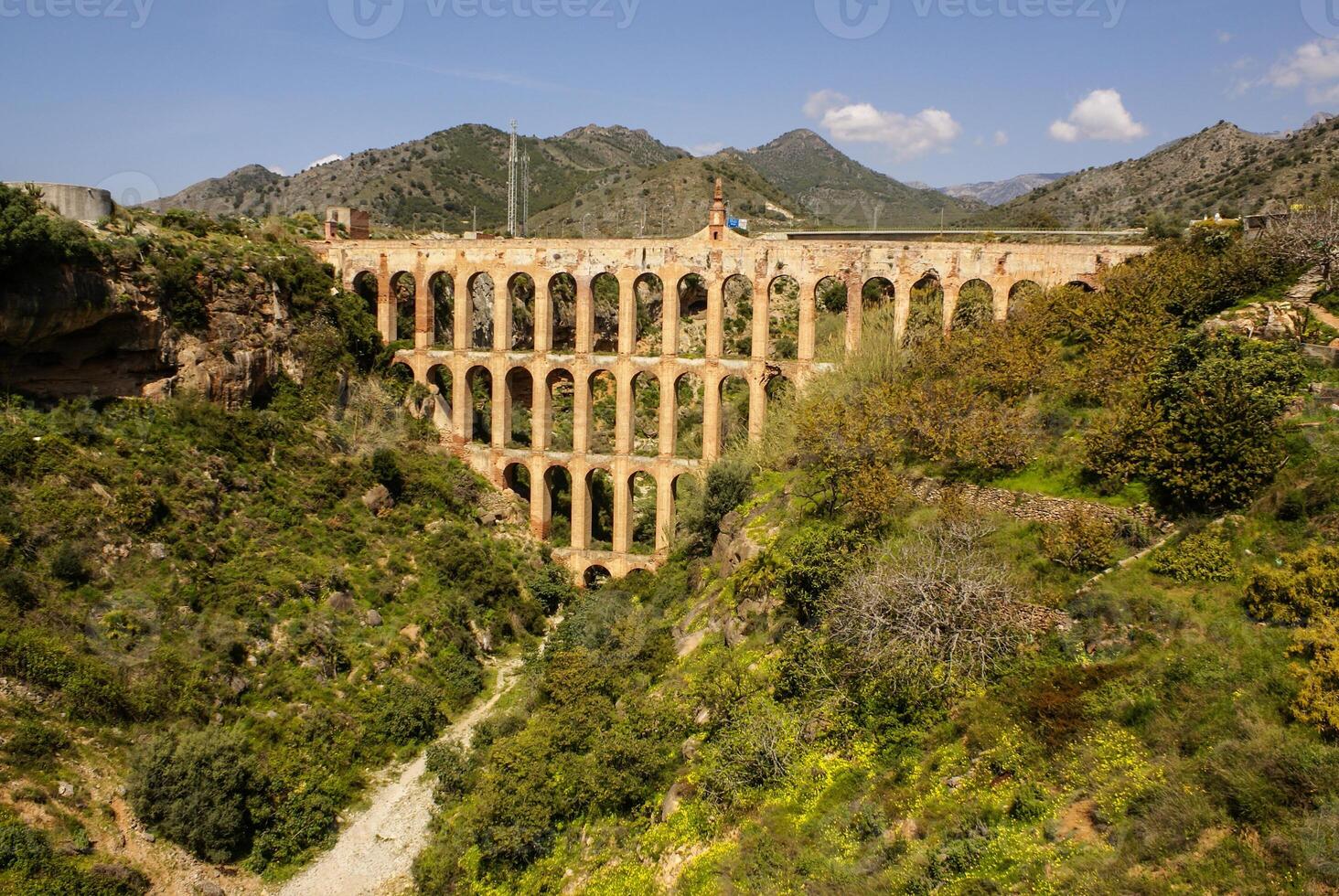 Old aqueduct in Nerja, Costa del Sol, Spain photo