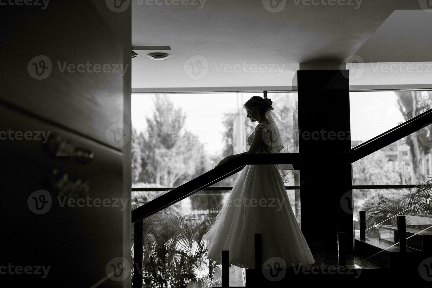 meeting of the bride and groom in the hotel lobby photo