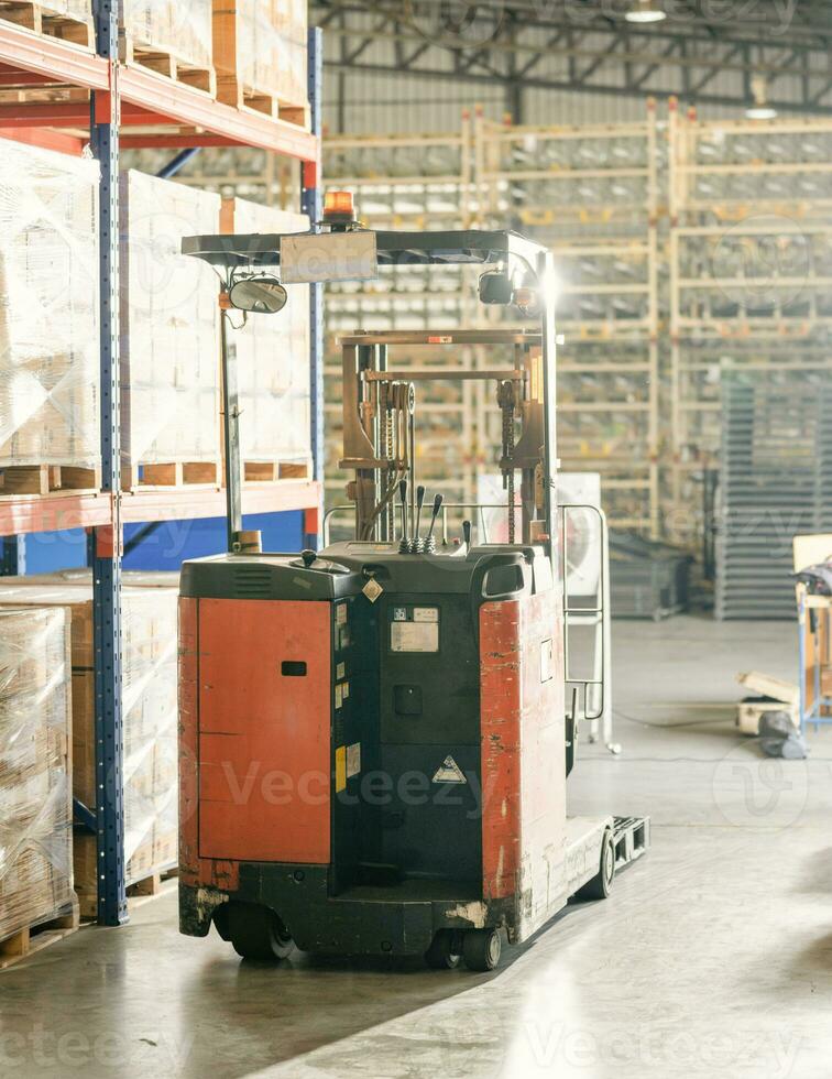 Forklift machine in the warehouse. photo