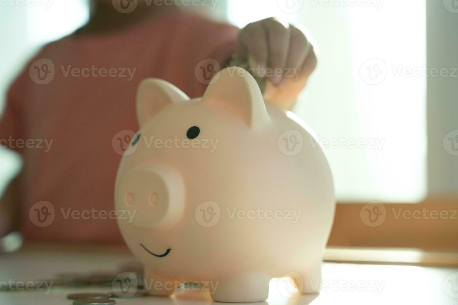 Save money. children putting coin for saving. wealth, Finance, insurance, investment, education, future, plan life, learn, banking, family, health, health and accident insurance. photo