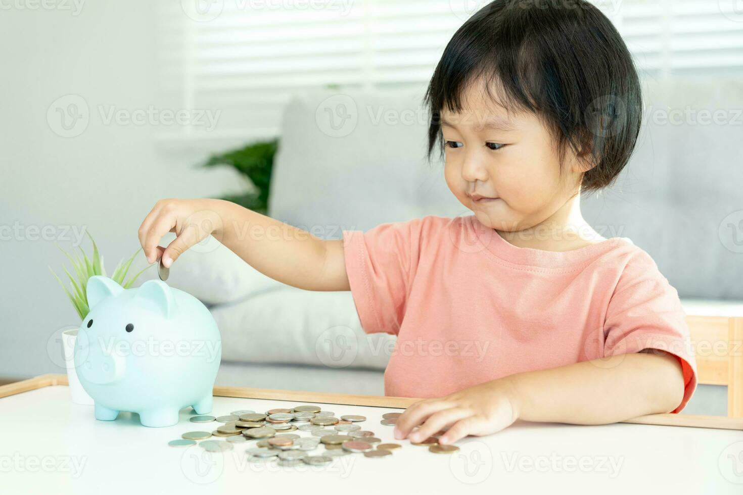 Save money. children putting coin for saving. wealth, Finance, insurance, investment, education, future, plan life, learn, banking, family, health, health and accident insurance. photo