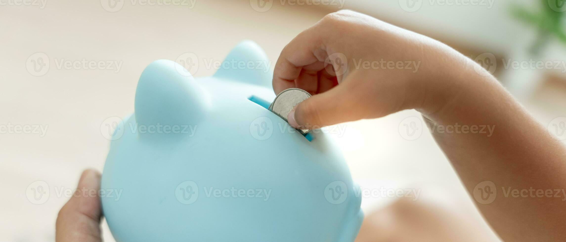 Save money. children putting coin for saving. wealth, Finance, insurance, investment, education, future, plan life, learn, banking, family, health, health and accident insurance. photo