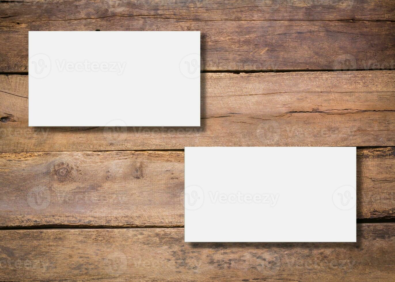 Blank business card presentation on wooden background photo