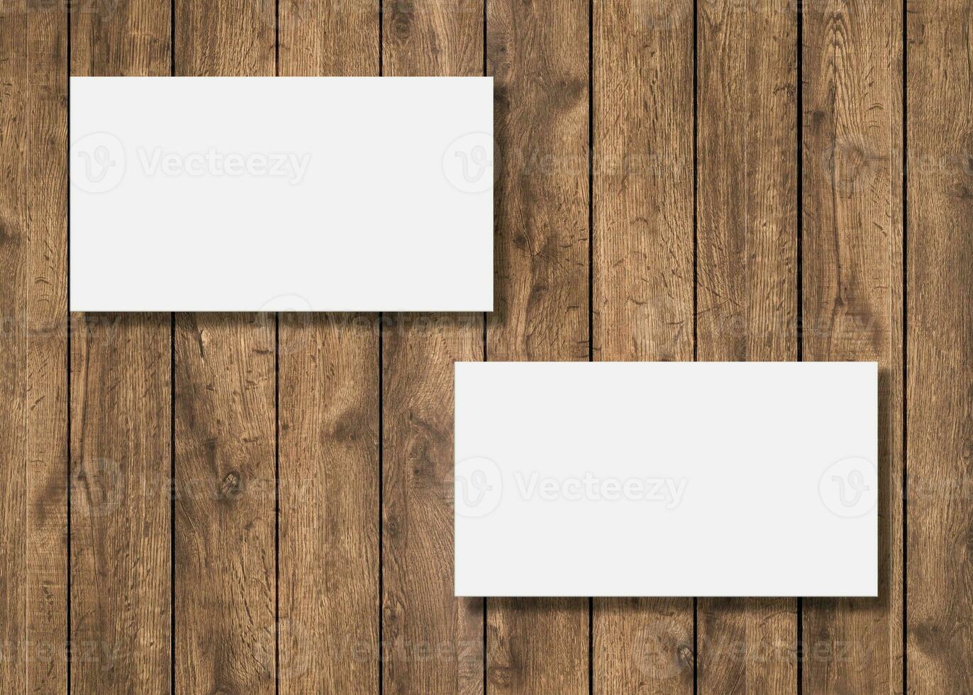 Blank business card presentation on wooden background photo