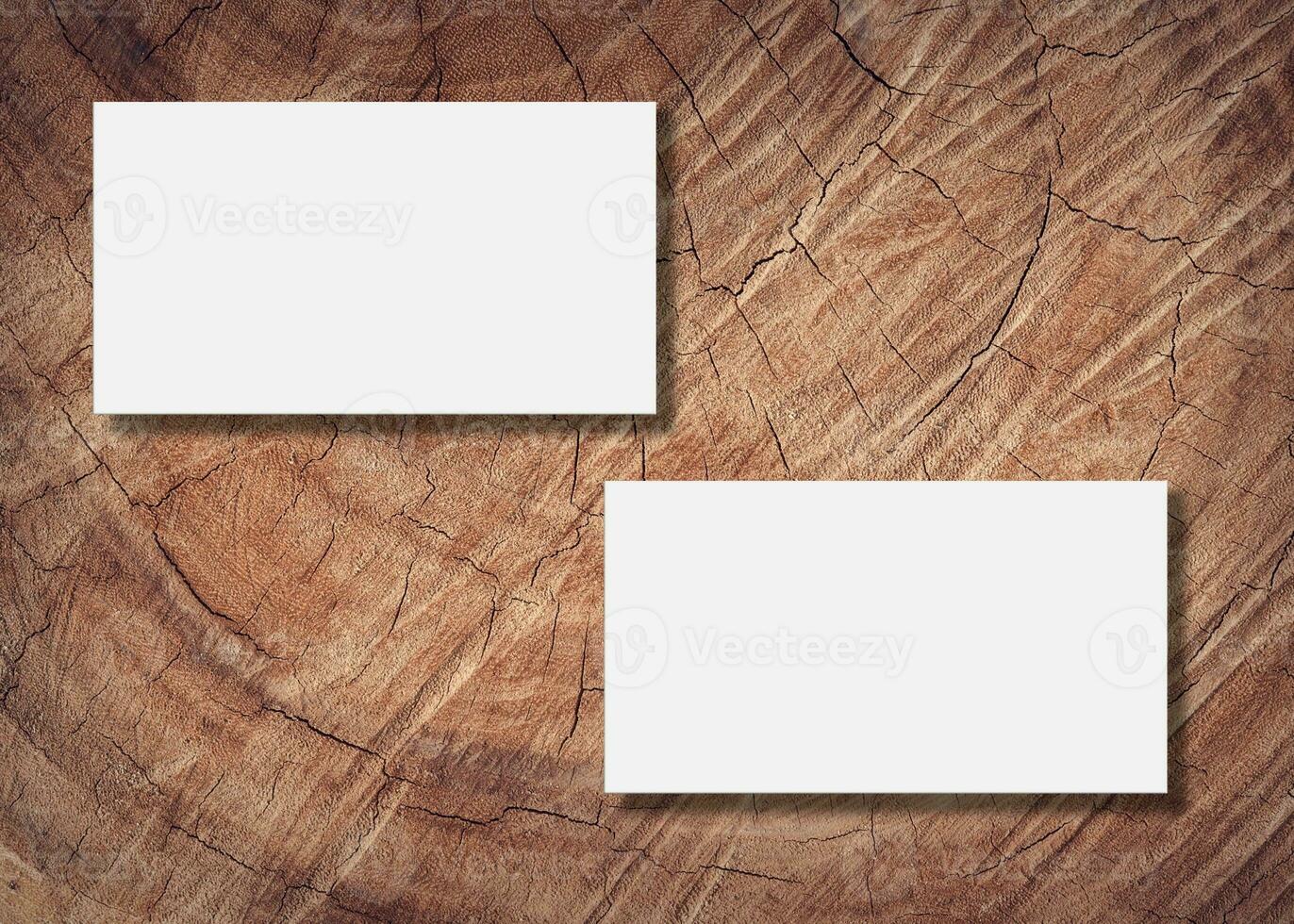 Blank business card presentation on wooden background photo