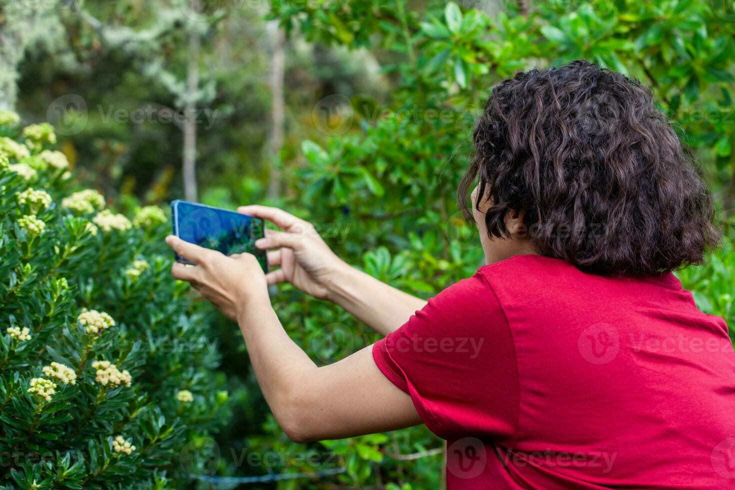 Young woman exploring the nature of a beautiful paramo at the department of Cundinamarca in Colombia photo