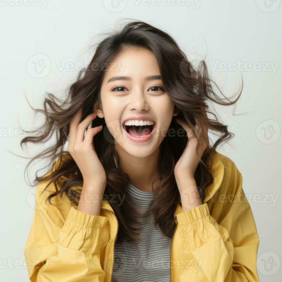 AI generated Curly optimistic woman raises palms from joy, happy to receive awesome present from someone, shouts loudly, dressed in casual t shirt, isolated on beige background. Excited female yells. photo