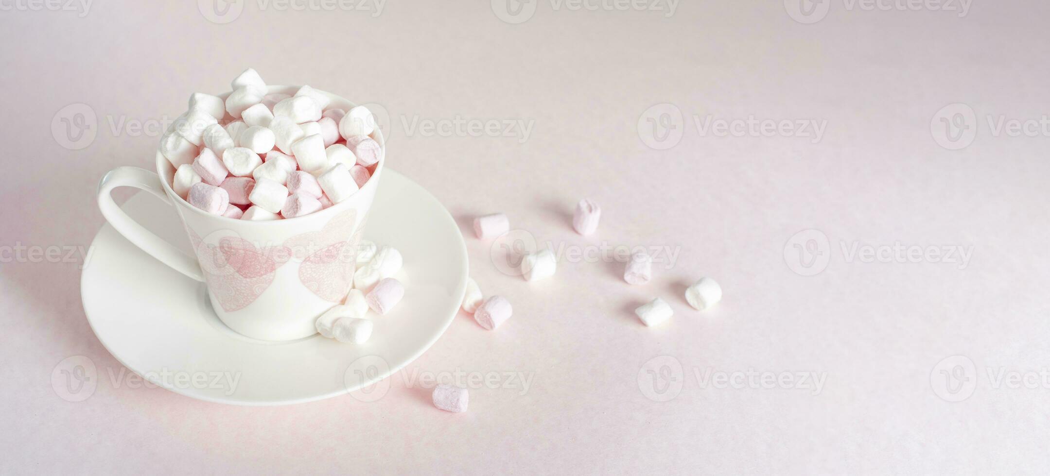 pastel peach still life with mini marshmallows in porcelain cup with pink hearts, gift for Mother's Day,Valentine's Day photo