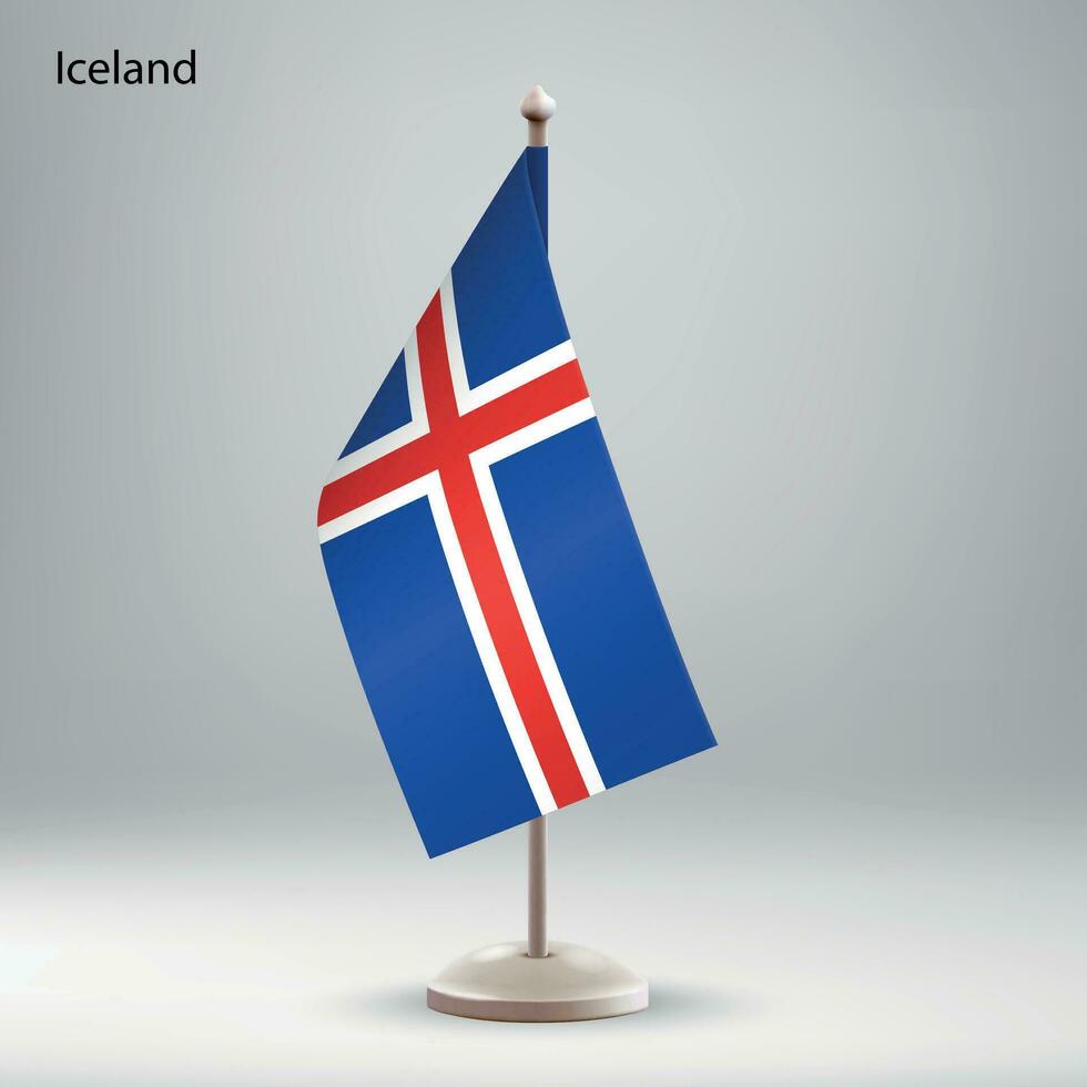 Flag of Iceland hanging on a flag stand. vector