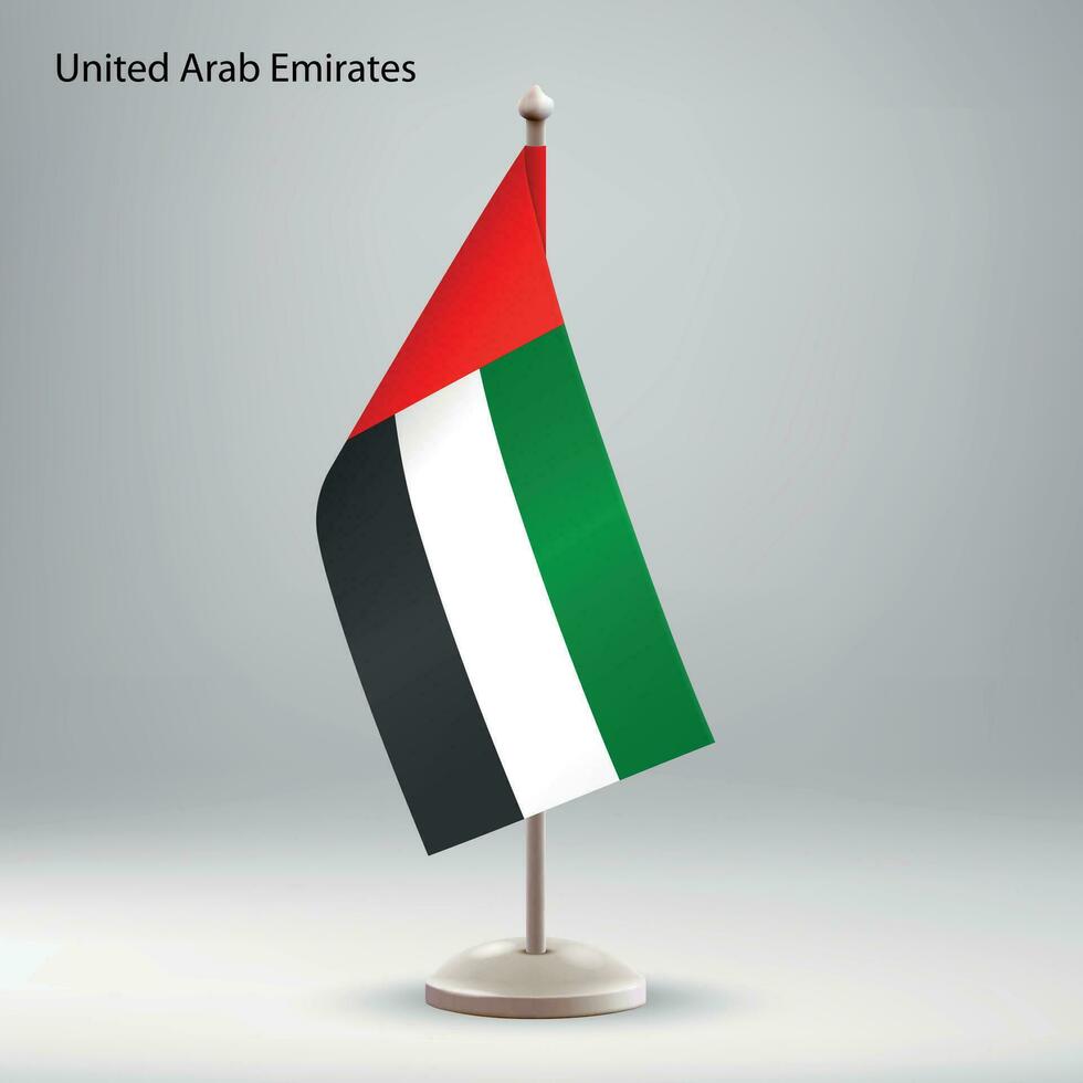 Flag of United Arab Emirates hanging on a flag stand. vector