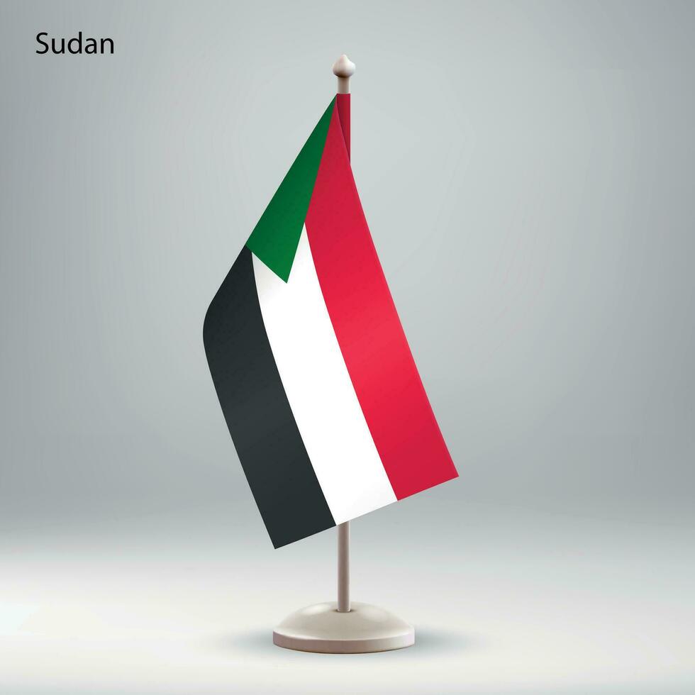 bandera de Sudán colgando en un bandera pararse. vector