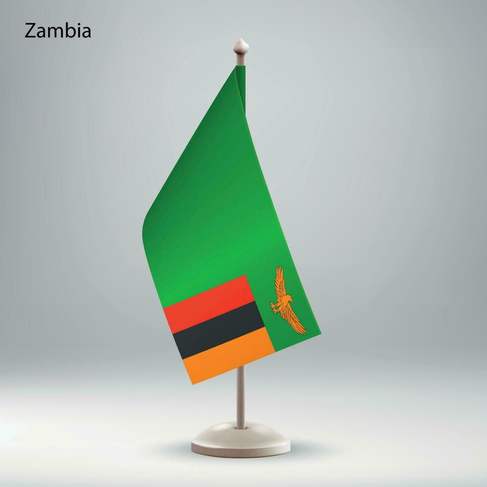 Flag of Zambia hanging on a flag stand. vector