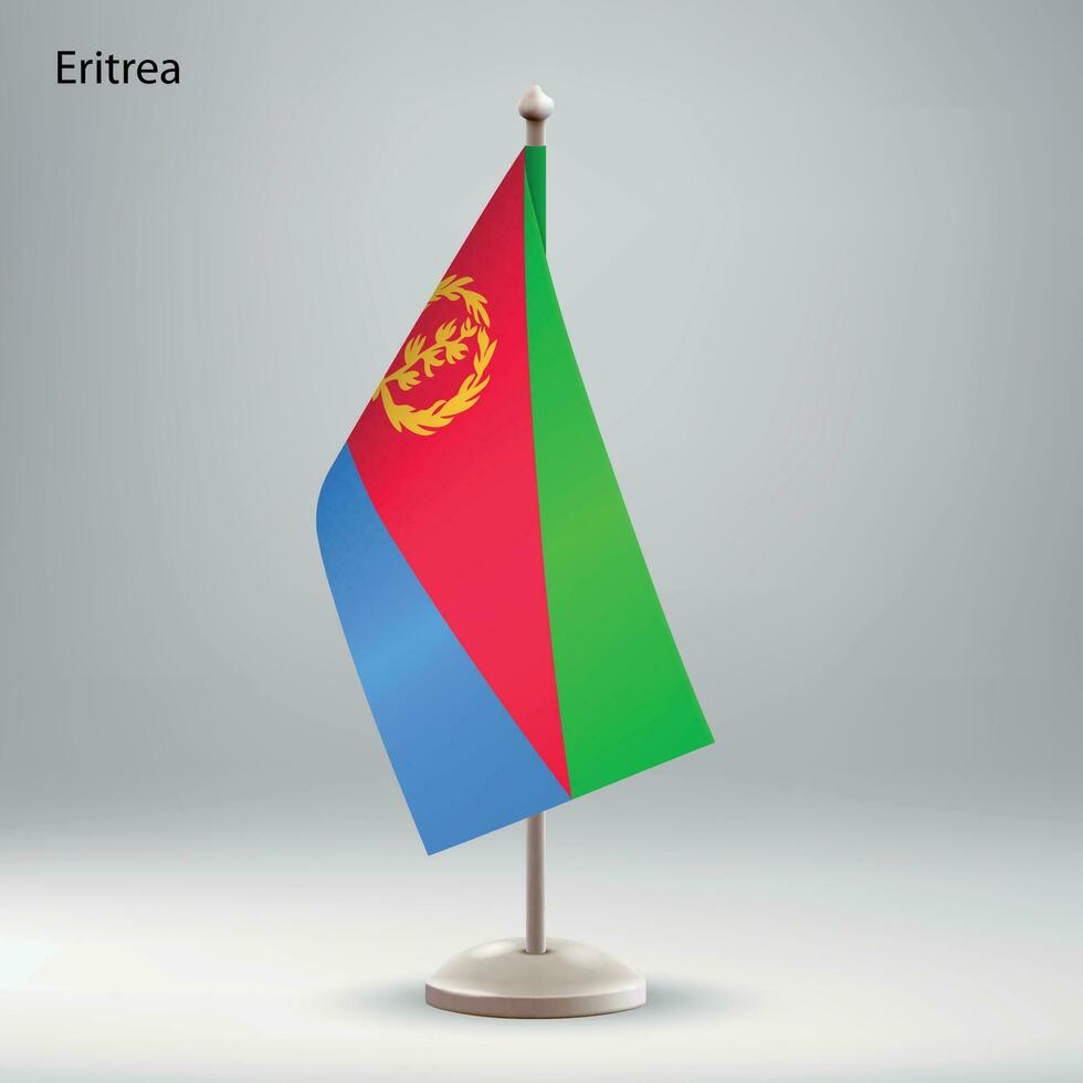 bandera de eritrea colgando en un bandera pararse. vector