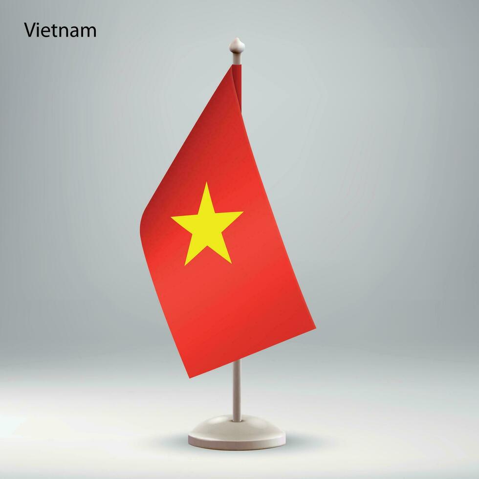 bandera de Vietnam colgando en un bandera pararse. vector