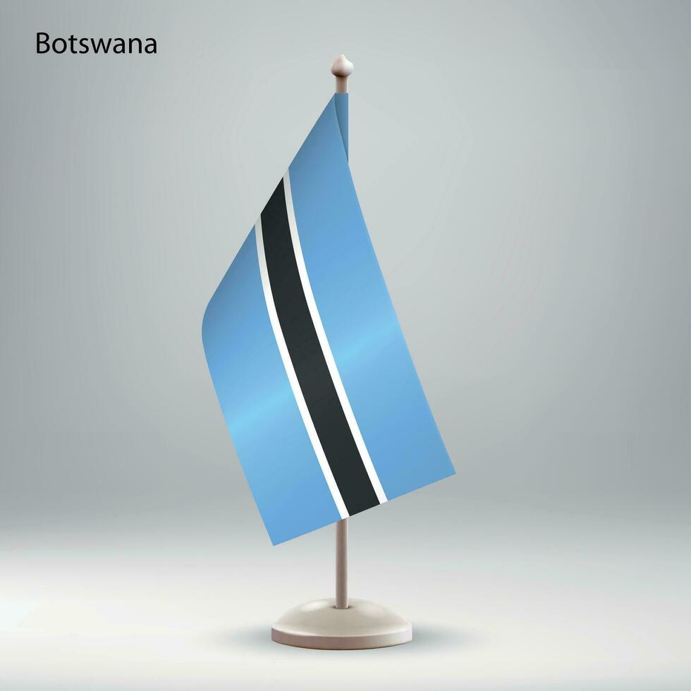 bandera de Botswana colgando en un bandera pararse. vector