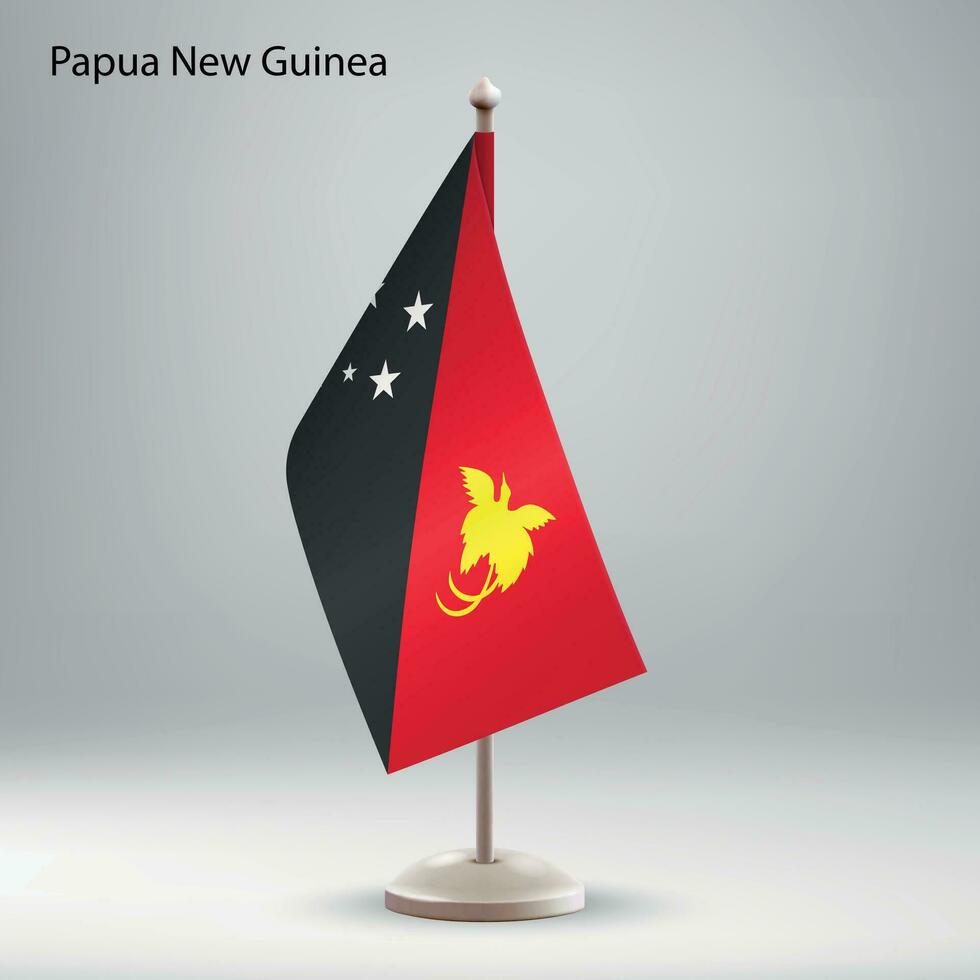 Flag of Papua New Guinea hanging on a flag stand. vector
