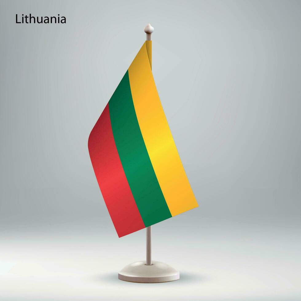 Flag of Lithuania hanging on a flag stand. vector