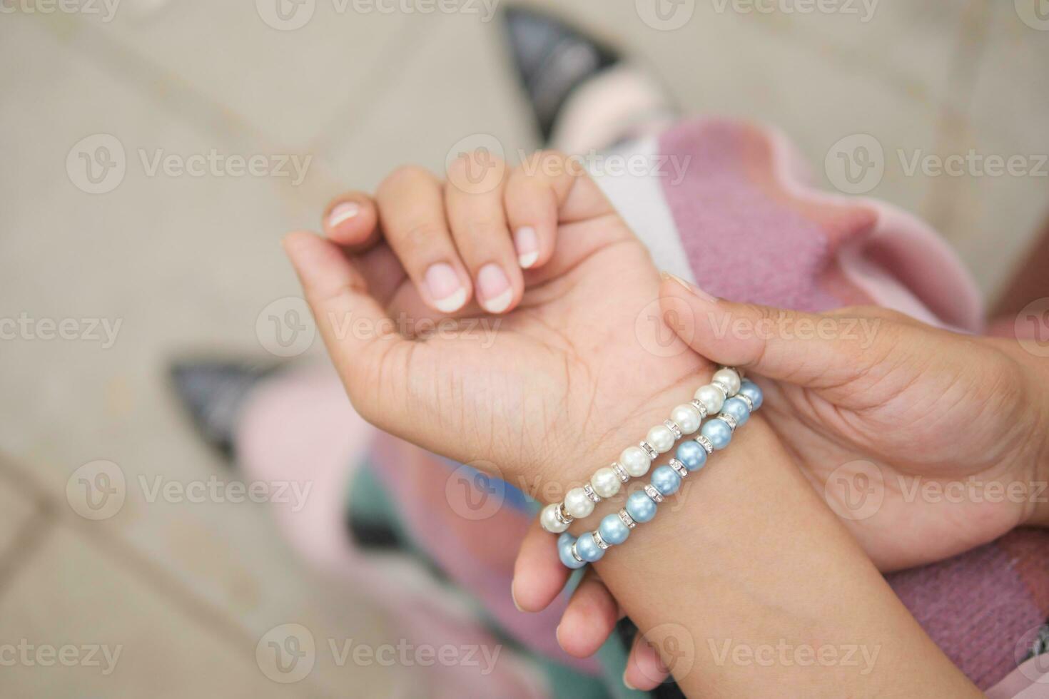 Young women hands suffering wrist pain, photo