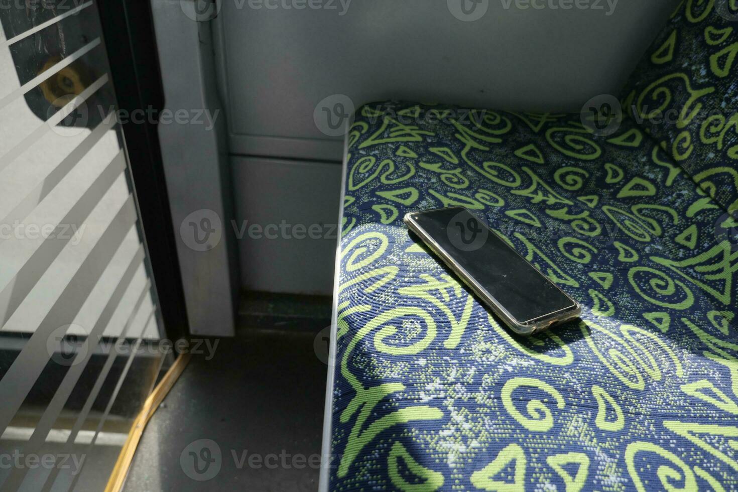 forget smartphone on public bus sit photo