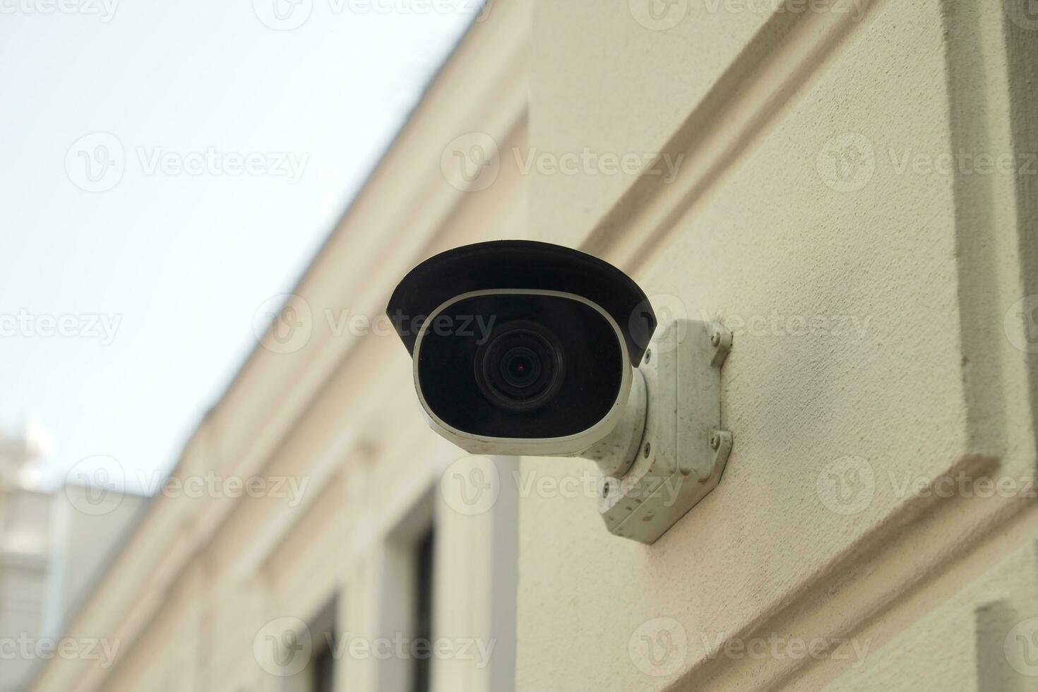 CCTV security camera operating outdoor photo