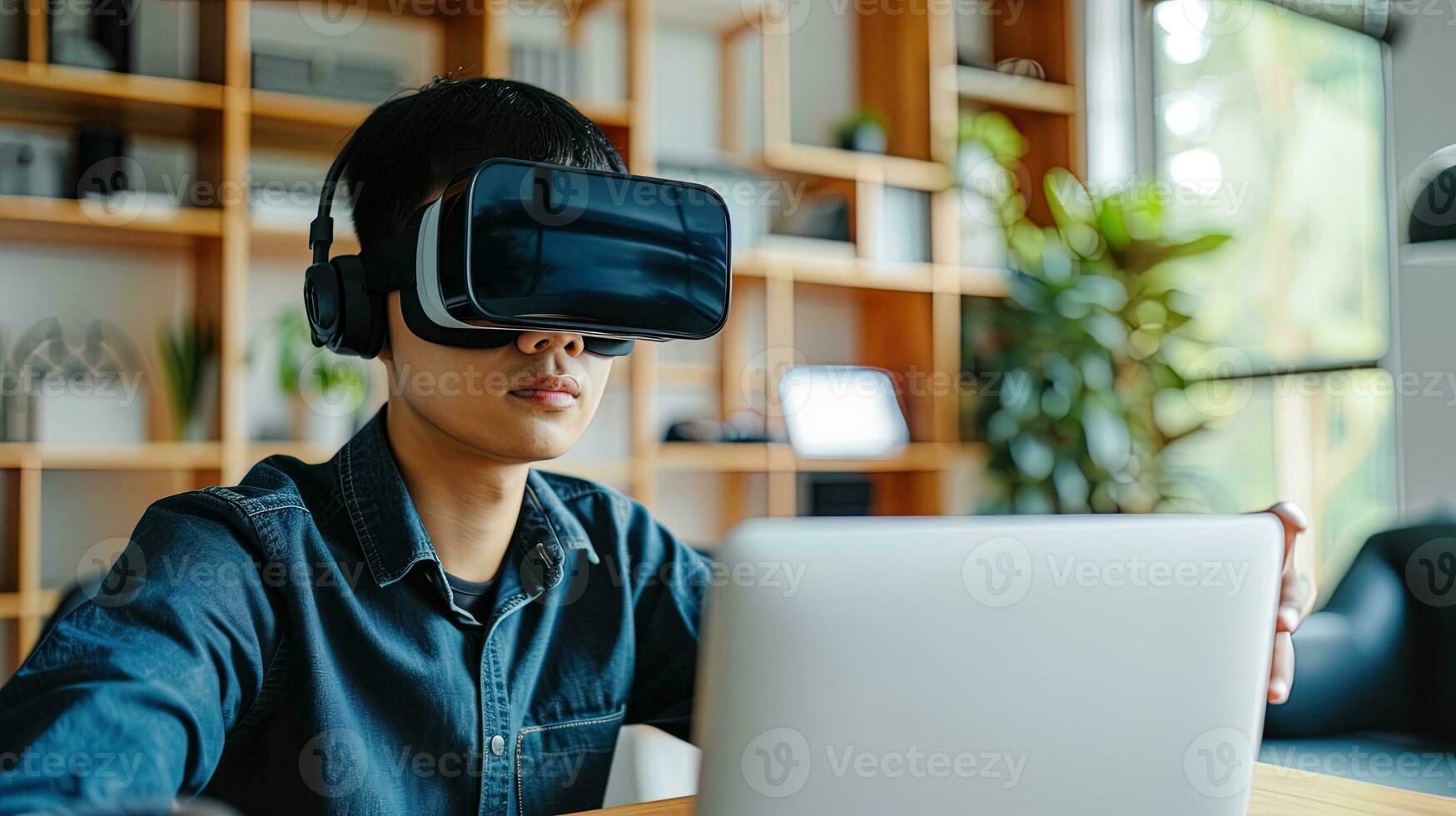 AI generated Young asian man wearing virtual reality headset and using laptop at home, ai generative photo