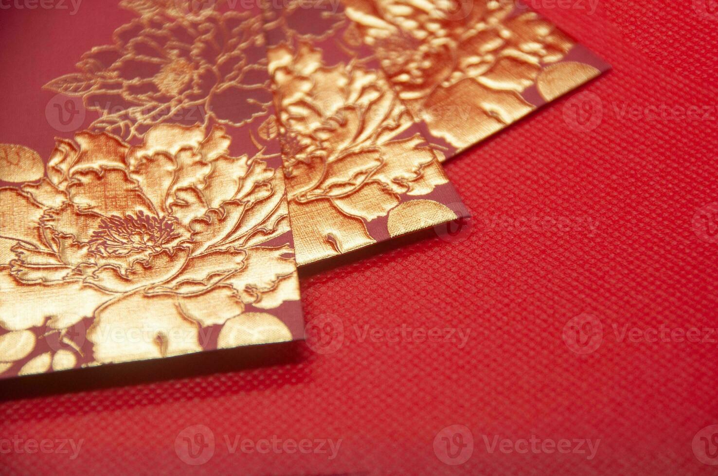 Red envelope on red background with customizable space for text. Chinese New Year celebration photo