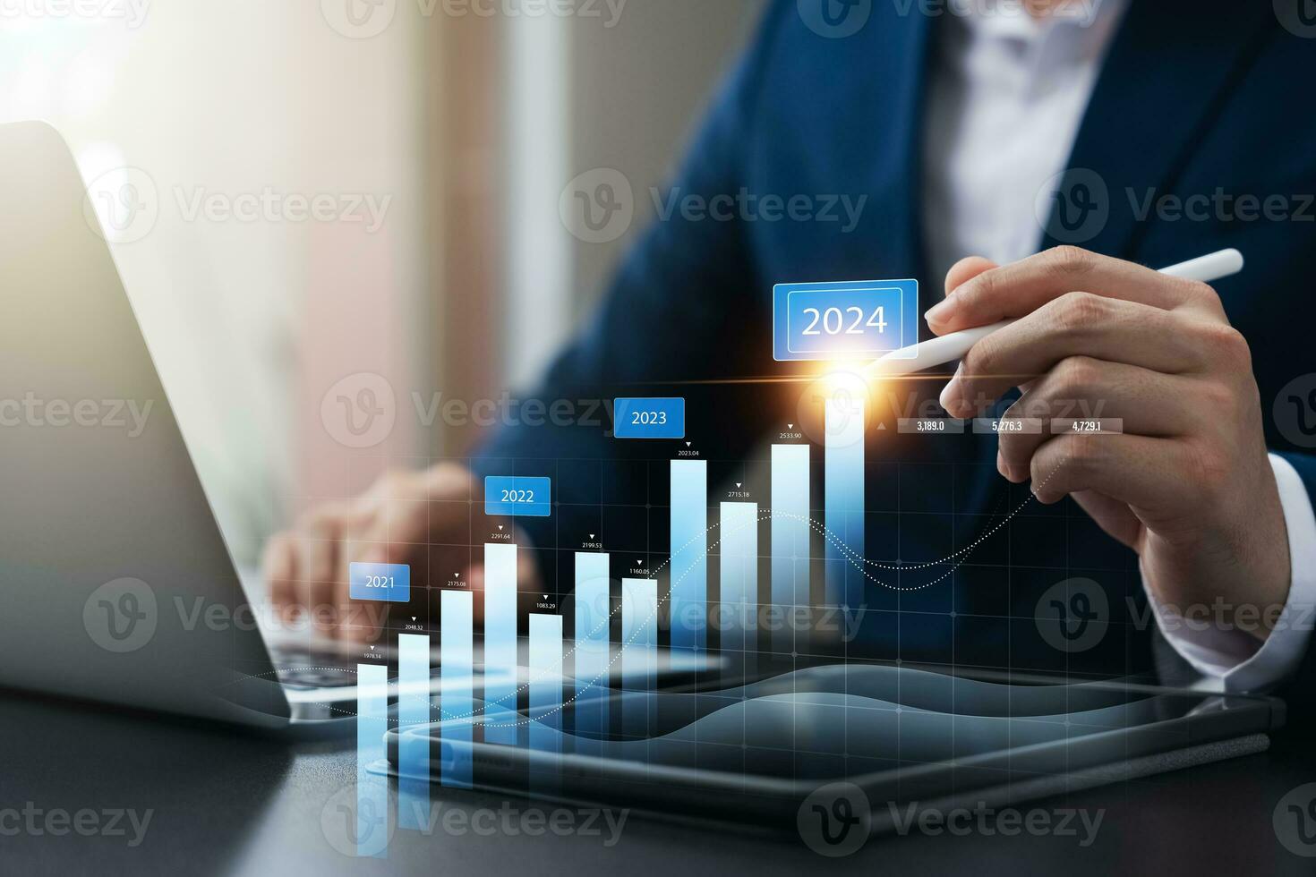 businessman new year business goals 2024, positive indicators 2024, company competitiveness on global scale, businessman calculating financial data for long term investments. photo