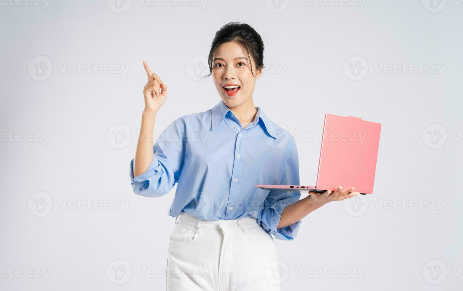 Portrait of young Asian businesswoman, isolated on white background photo