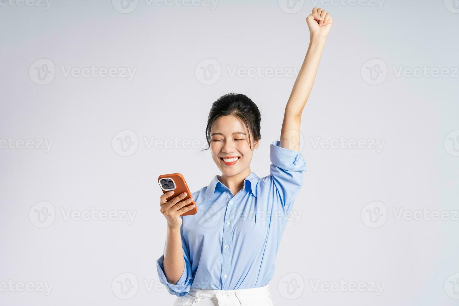 Portrait of young Asian businesswoman, isolated on white background photo