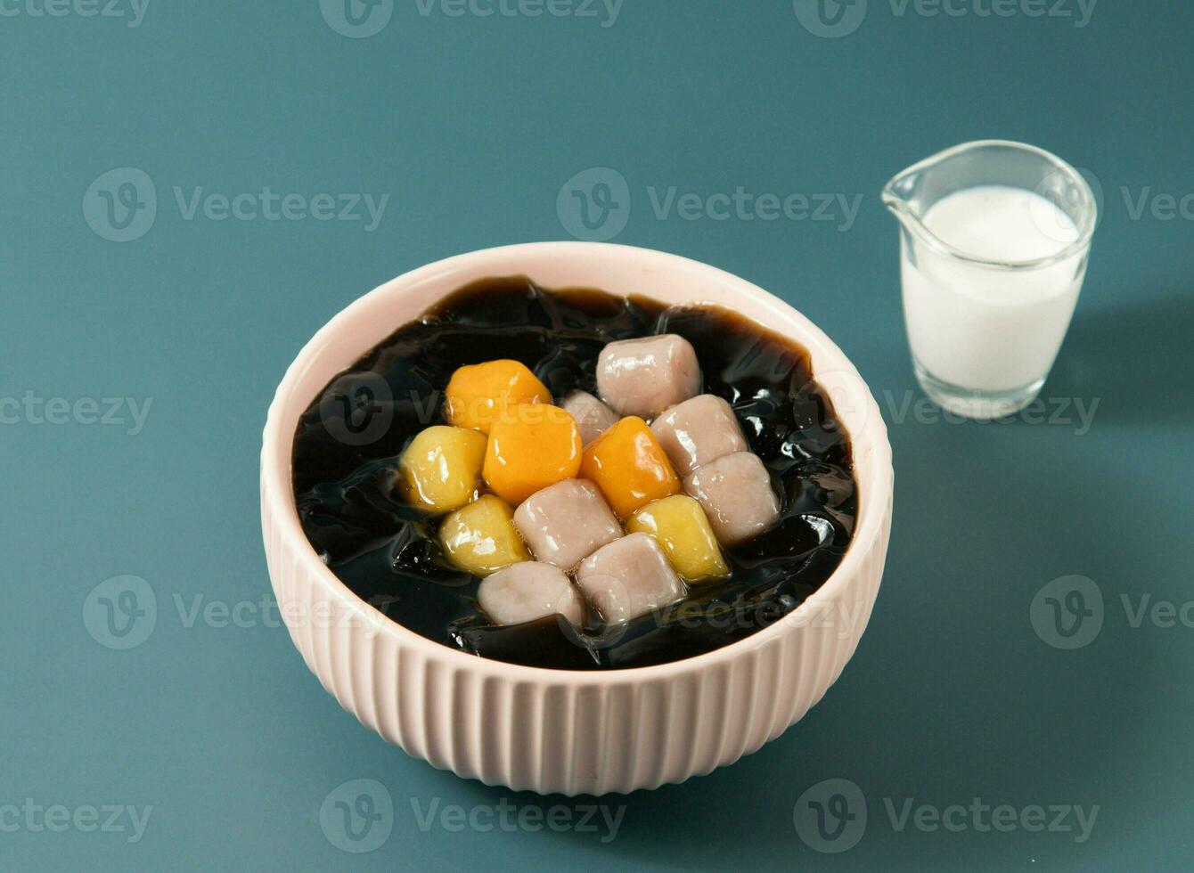 Taro Ball Panna Cotta served in bowl isolated on background top view of taiwan food photo