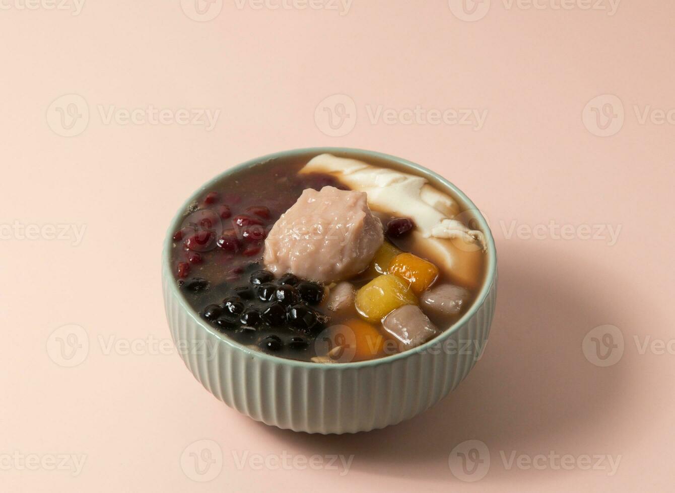 Signature Double Taro Tofu Curd served in bowl isolated on background top view of taiwan food photo