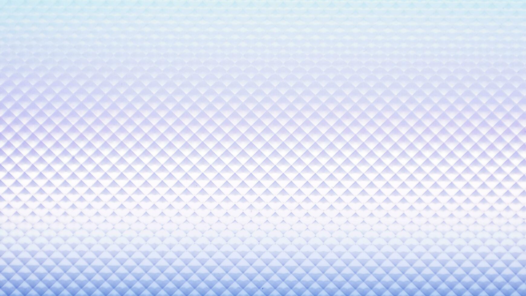 a blue and white background with a pattern of triangles photo