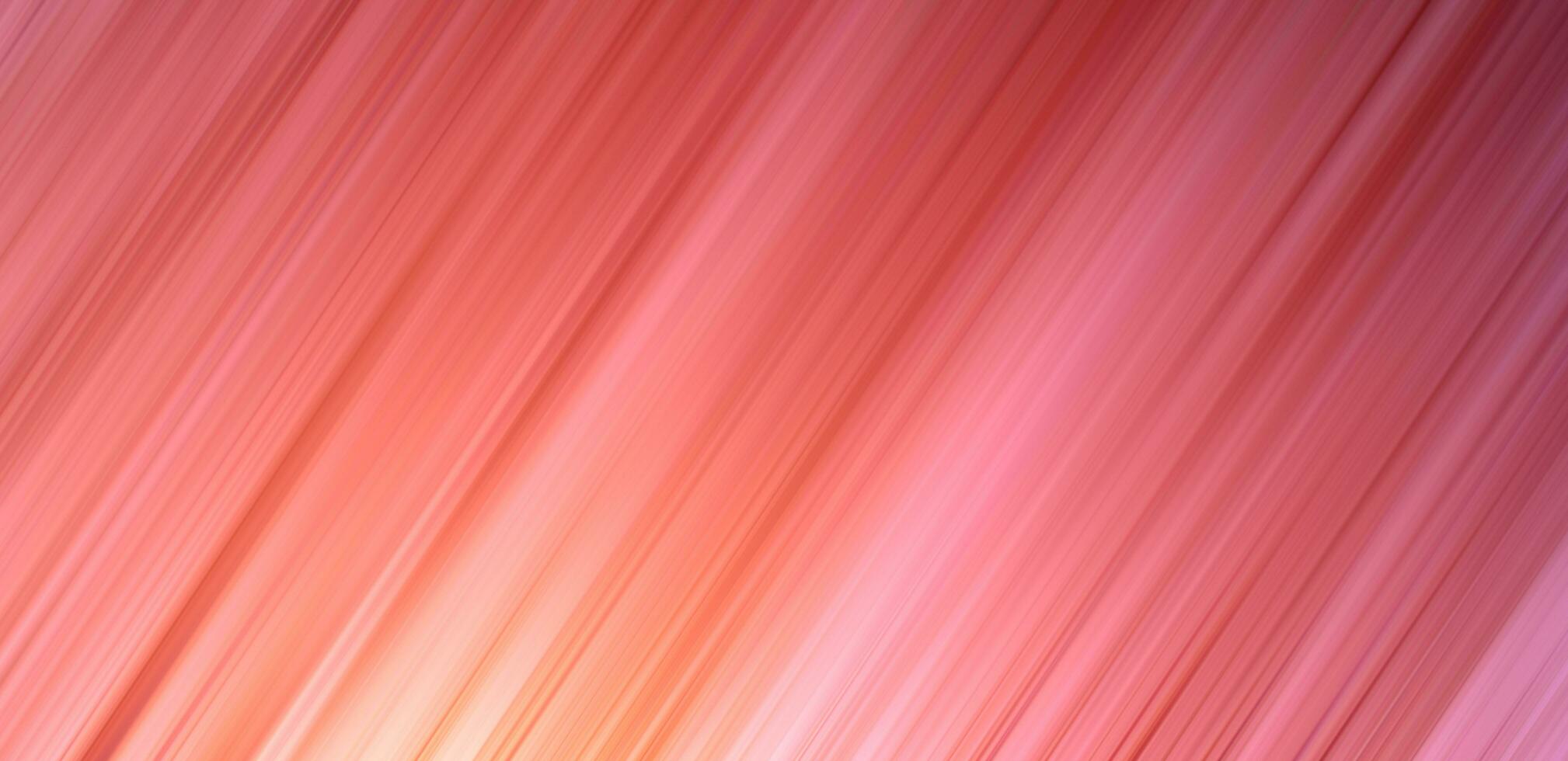 a pink and orange background with a blurred image photo
