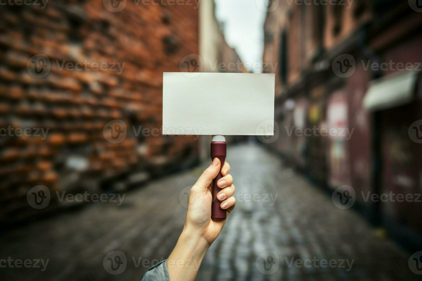 AI generated Urban protest male hand holding a blank sign against brick photo