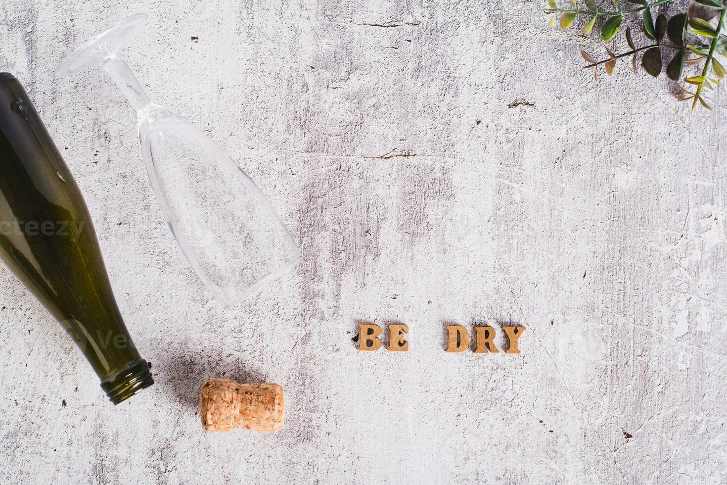 Sober January concept, text, glass, bottle and cork on the table top view photo