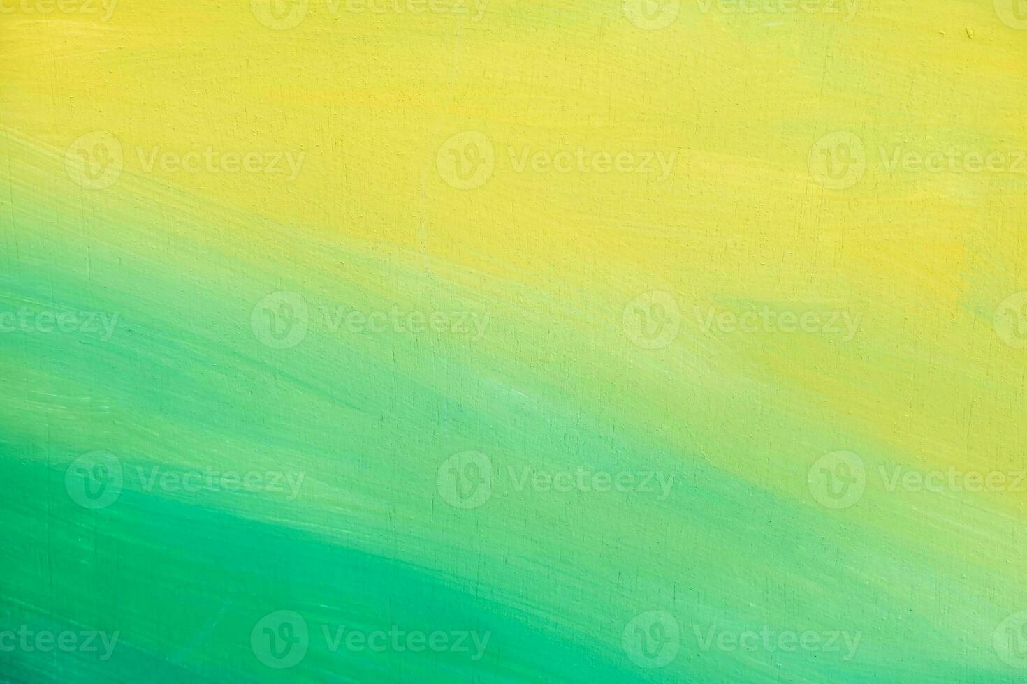 Bright gradient green and faded yellow coloured rustic and smudged wooden painted textured blank empty,Messy colorful paint brush surface, Multicolor paint splatter blank backdrop,gradient and texture photo