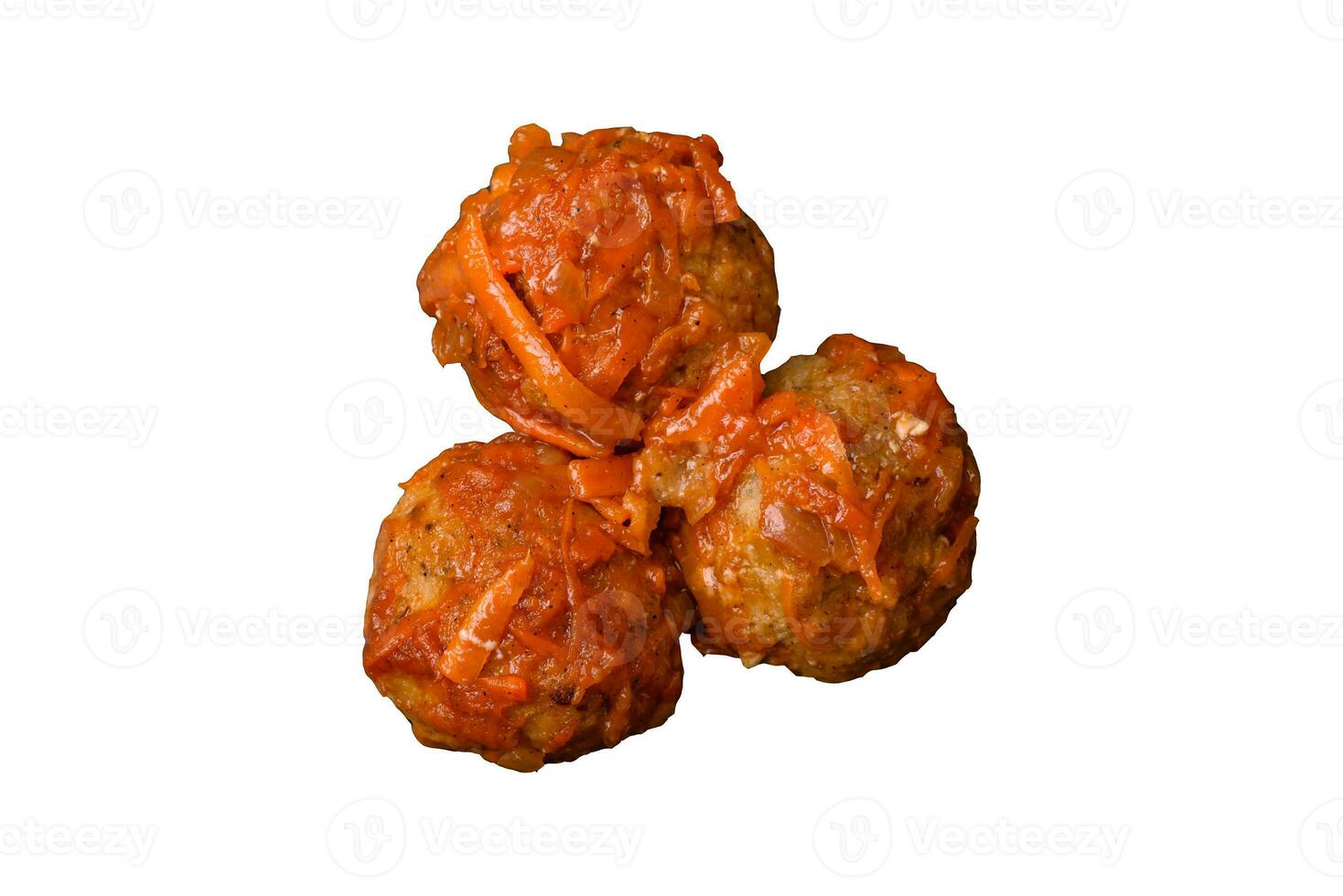 Delicious fresh meatballs from minced meat or fish with tomato sauce photo