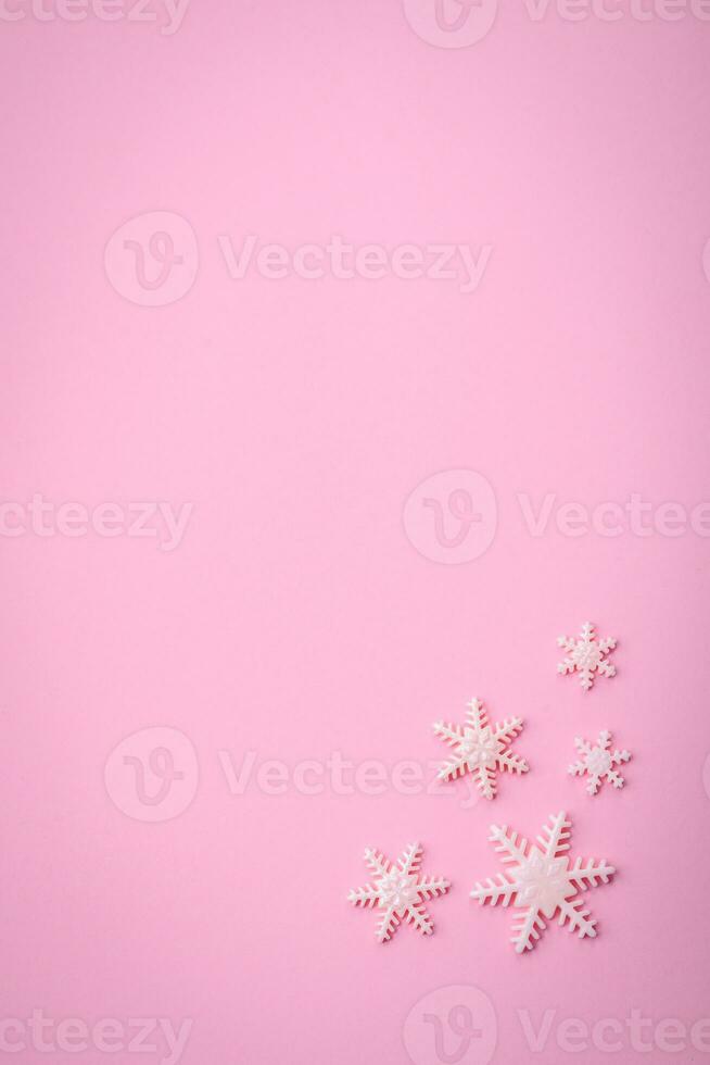 Beautiful winter snowflakes on a plain background with copy space photo