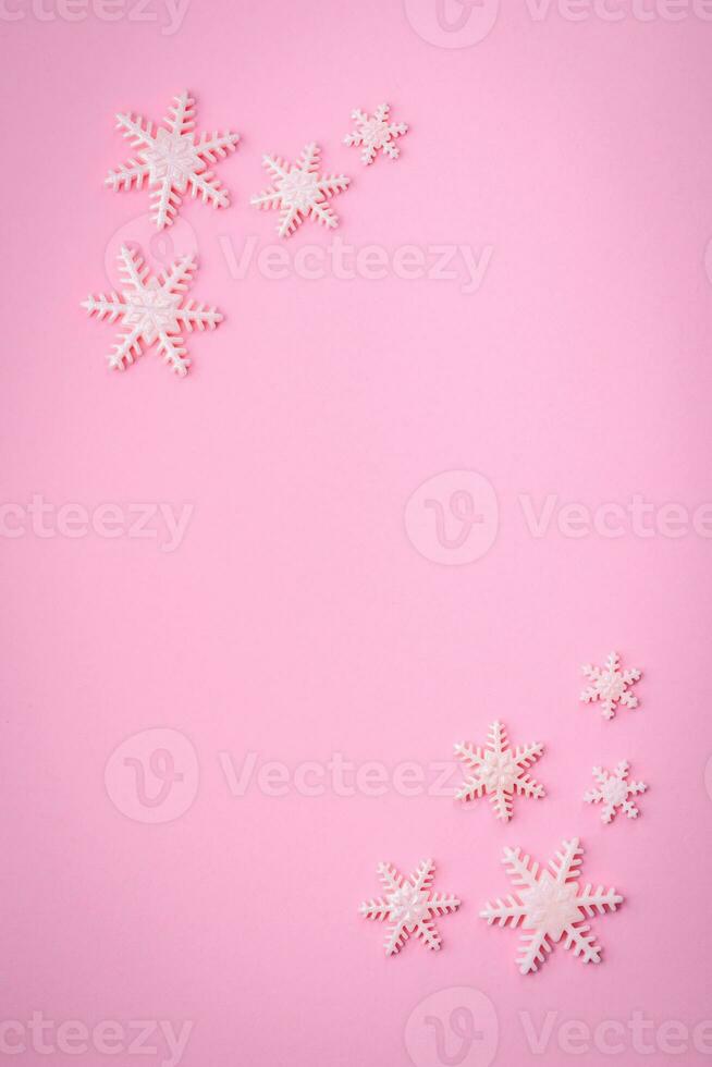 Beautiful winter snowflakes on a plain background with copy space photo