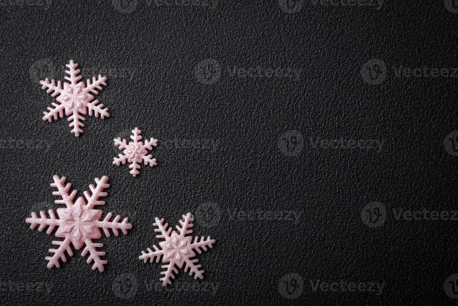 Beautiful winter snowflakes on a plain background with copy space photo