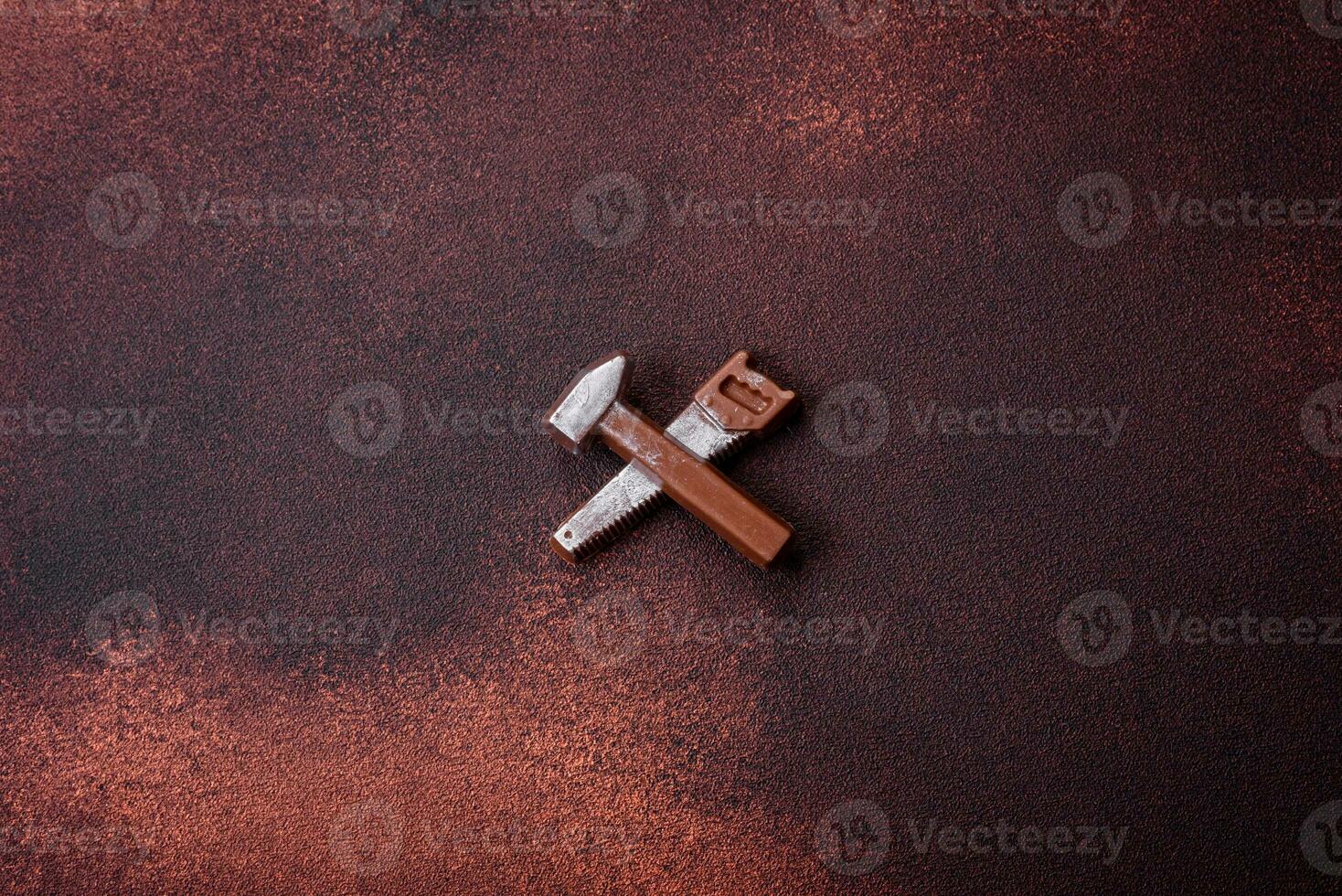 Tools and inscriptions symbolizing repairs or a garage and its attributes on a plain background photo