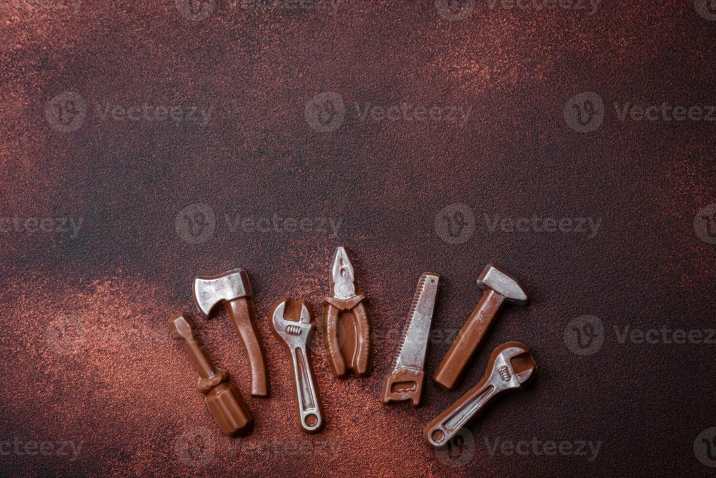 Tools and inscriptions symbolizing repairs or a garage and its attributes on a plain background photo