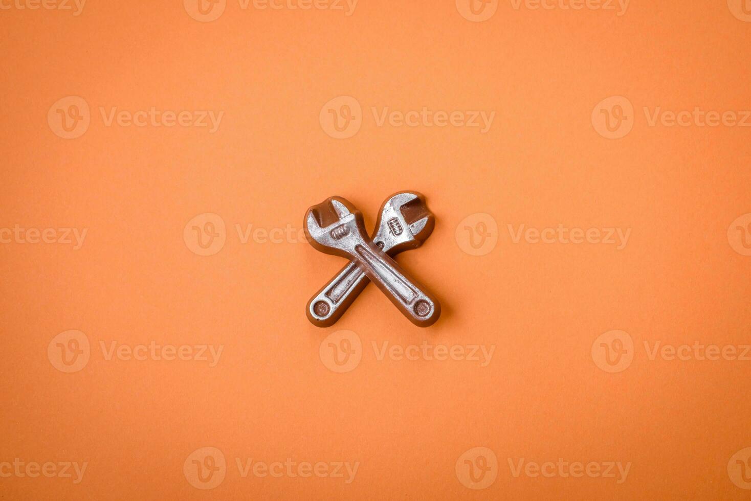 Tools and inscriptions symbolizing repairs or a garage and its attributes on a plain background photo