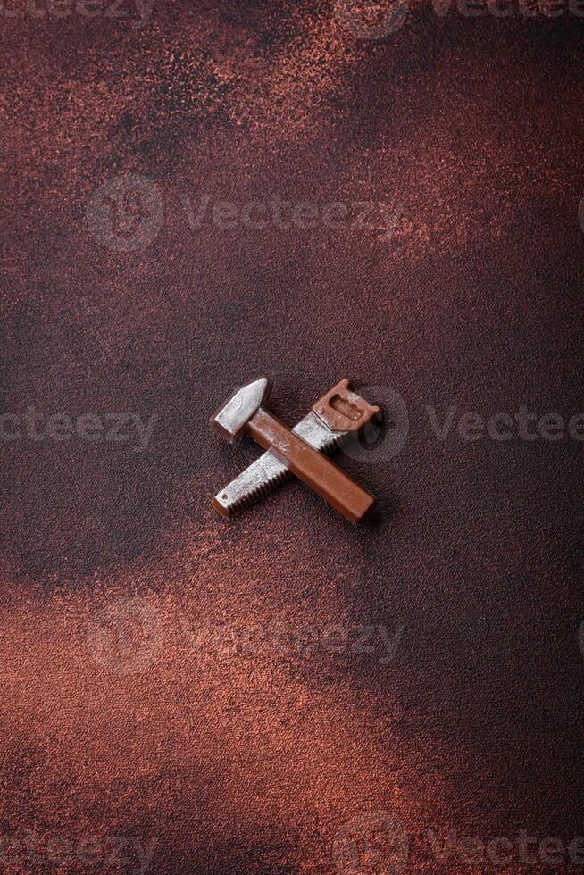 Tools and inscriptions symbolizing repairs or a garage and its attributes on a plain background photo