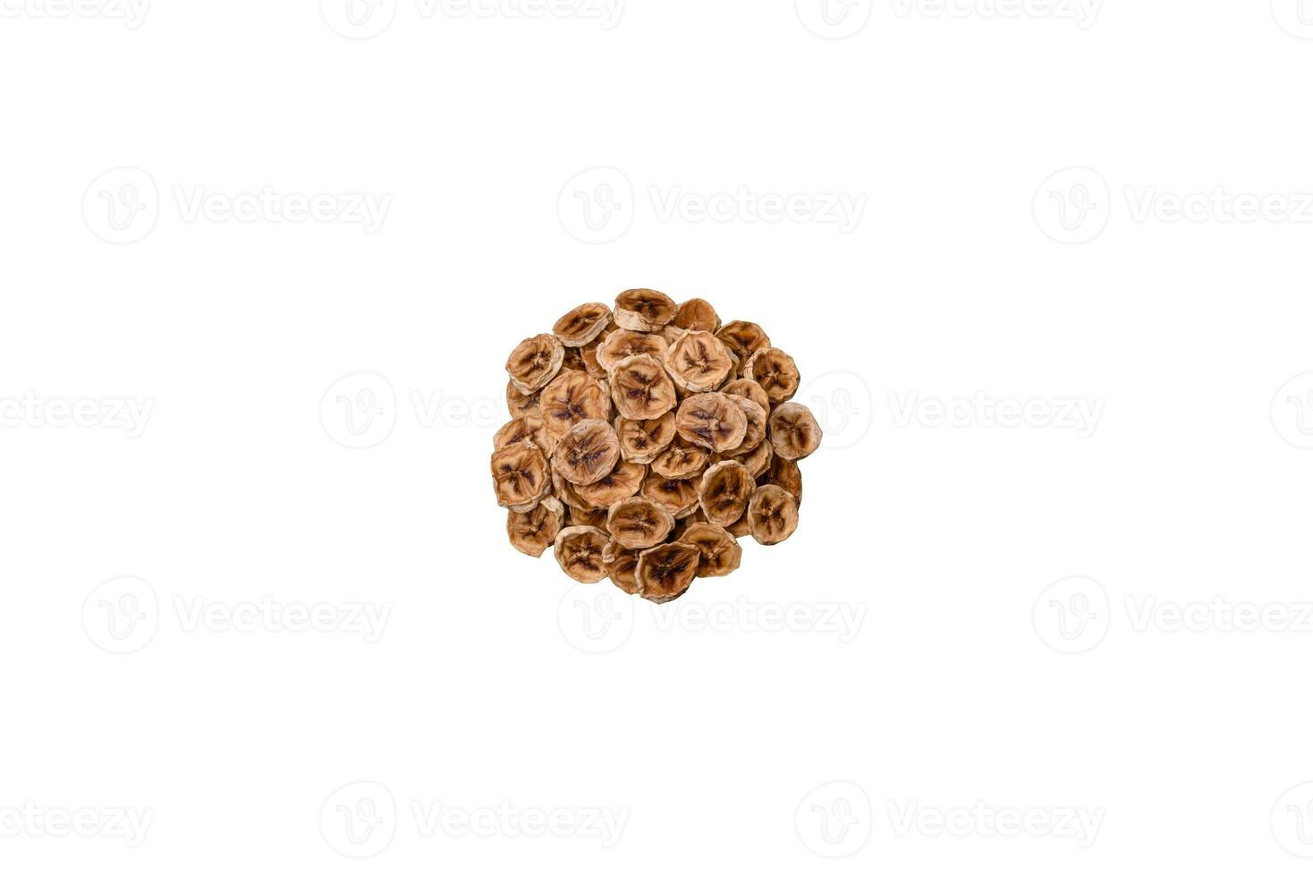 Round slices of sweet banana on a dark concrete background photo