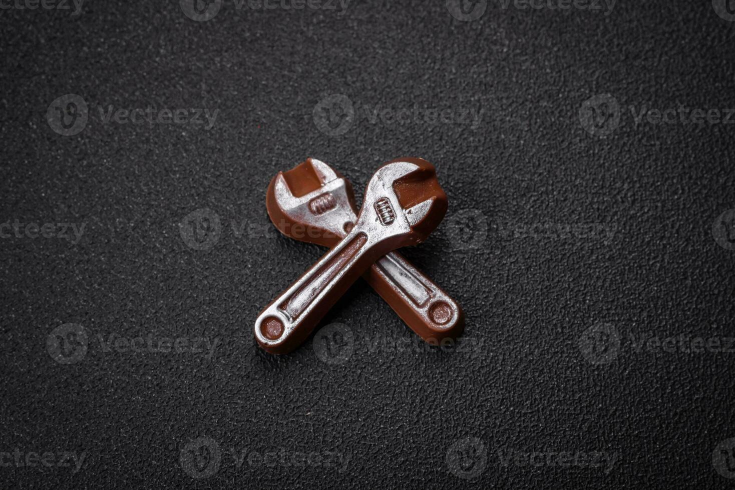 Tools and inscriptions symbolizing repairs or a garage and its attributes on a plain background photo